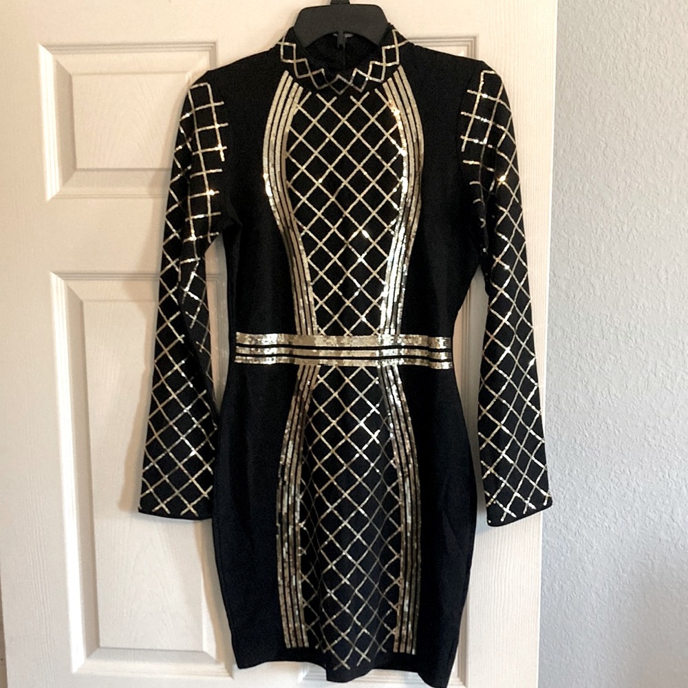 Beautiful black and gold Venus brand dress.